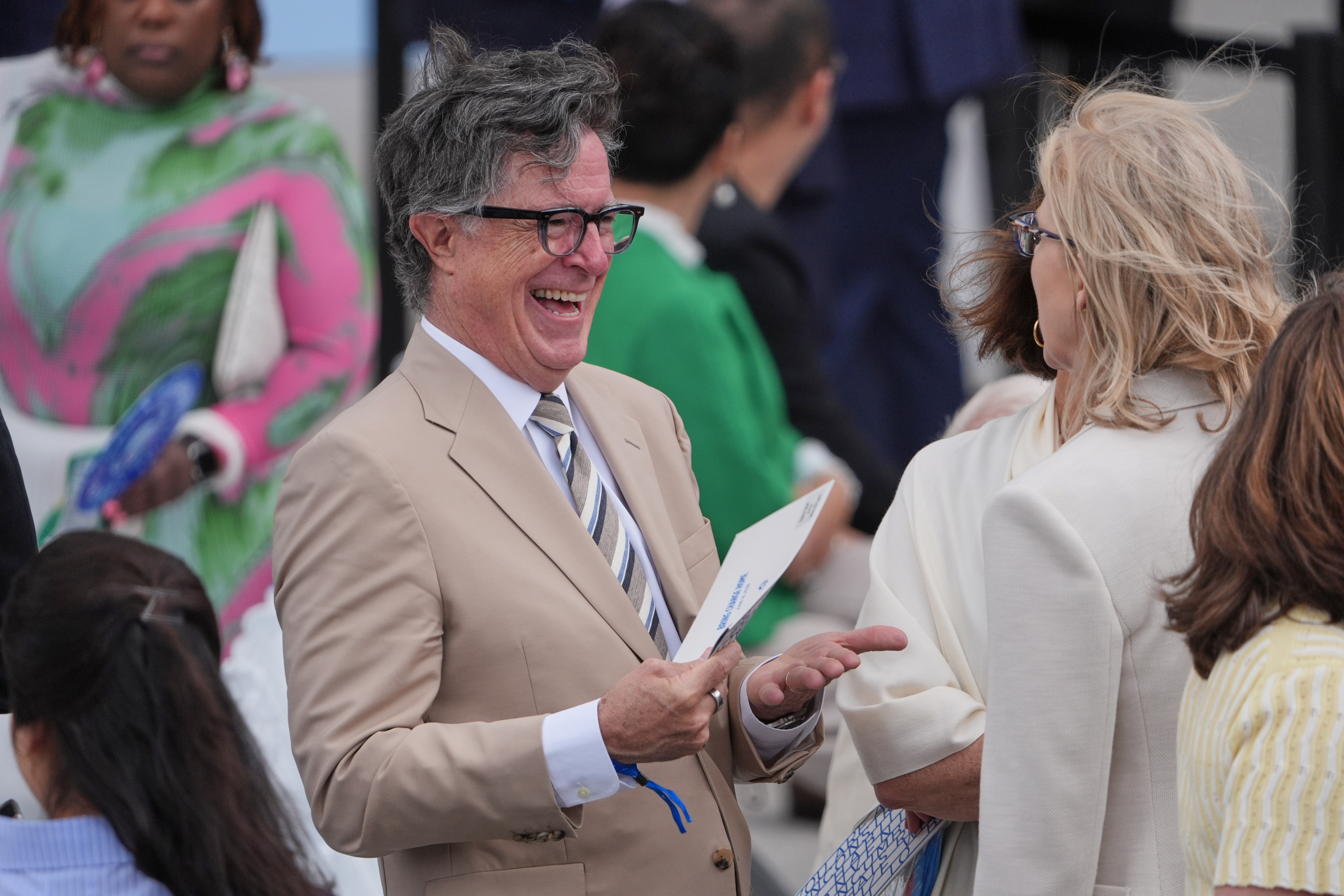 Stephen Colbert mingles ahead of the Obama Presidential Center dedication ceremony Thursday, June 18, 2026, in Chicago. (