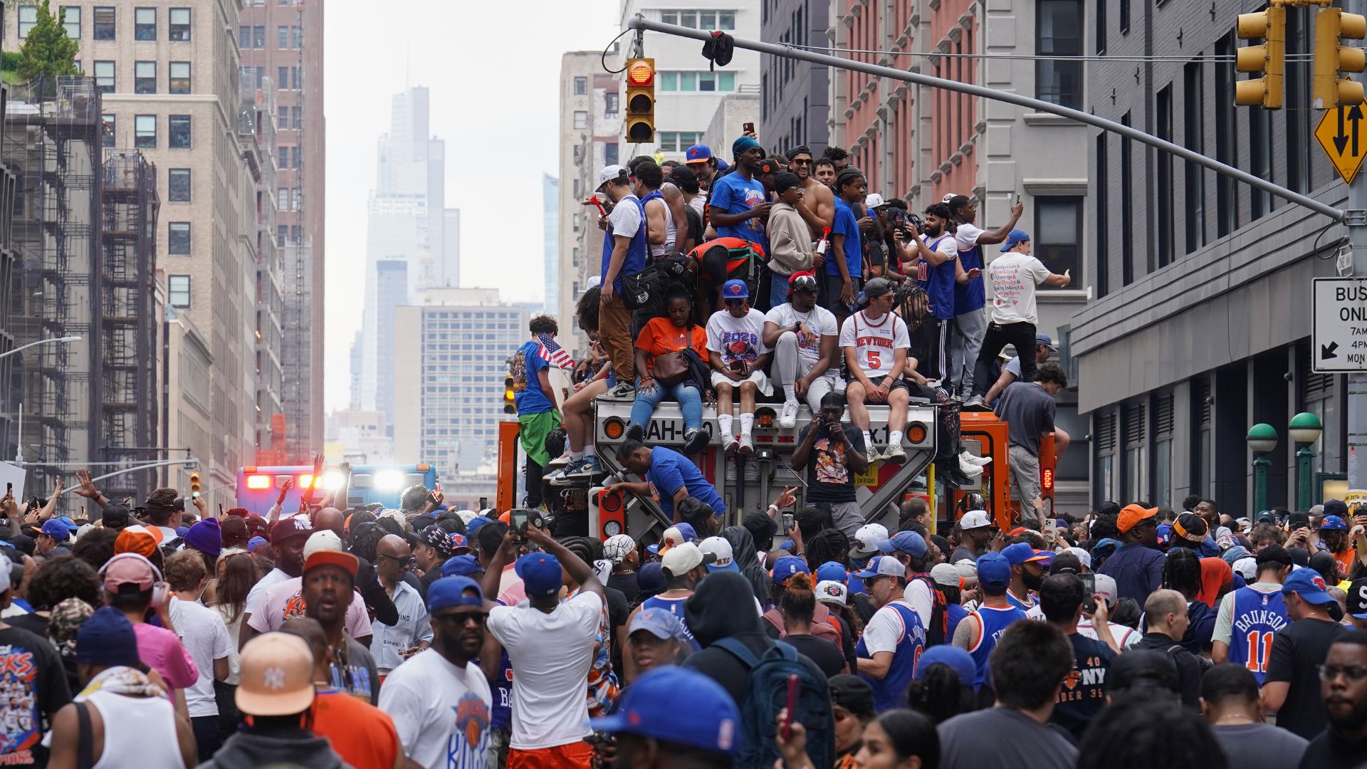 Fans celebrate during the New York Knicks' NBA championship parade Thursday, June 18, 2026, in New York. (AP Photo/Ryan Murphy)