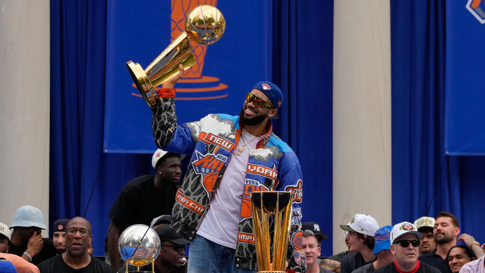 New York Knicks center Karl-Anthony Towns celebrates during the New York Knicks' NBA championship parade Thursday, June 18, 2026, in New York. (AP Photo/Yuki Iwamura)