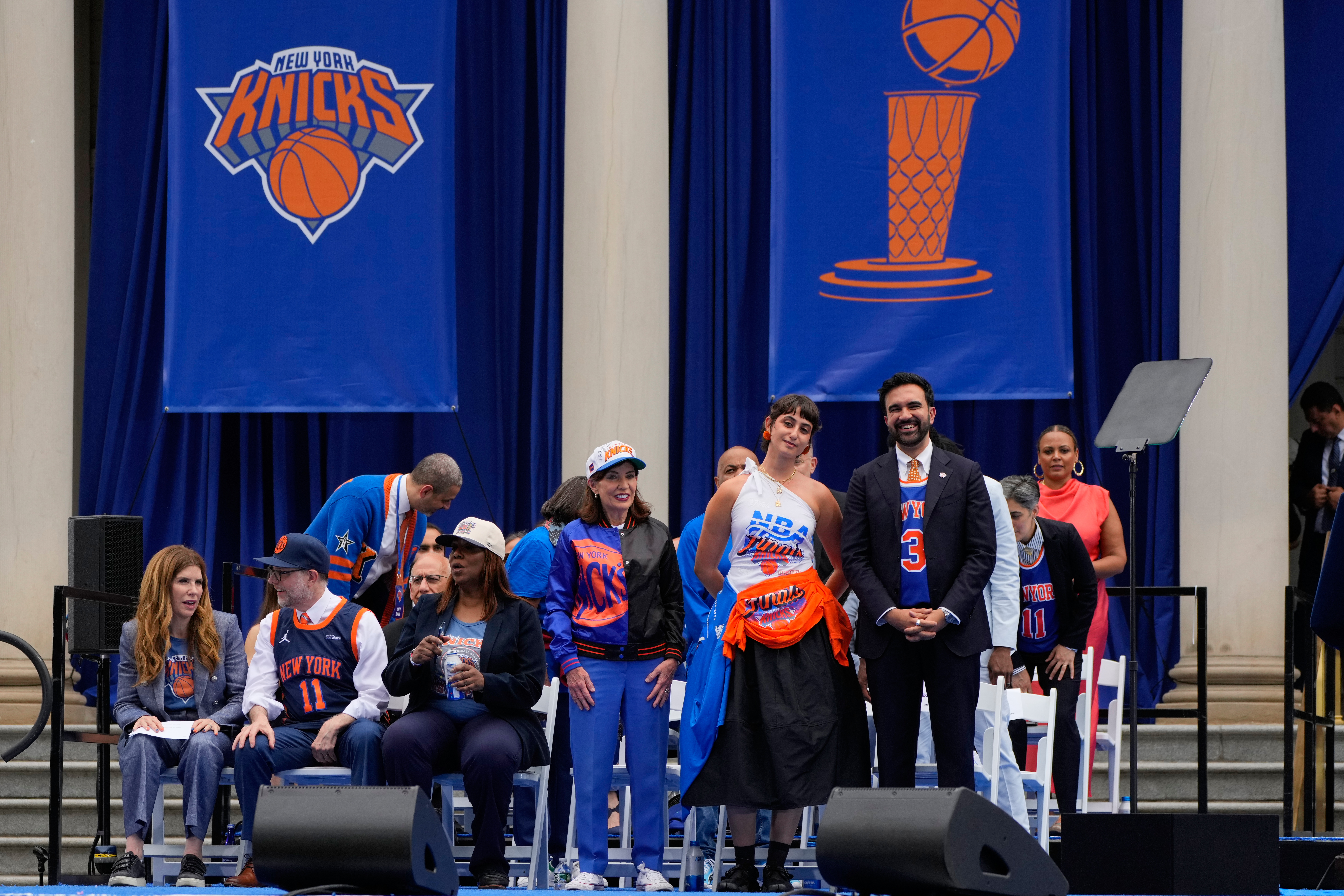 Mayor Zohran Mamdani, front right, and his wife, Rama Duwaji, react during the New York Knicks' NBA championship parade Thursday, June 18, 2026, in New York.