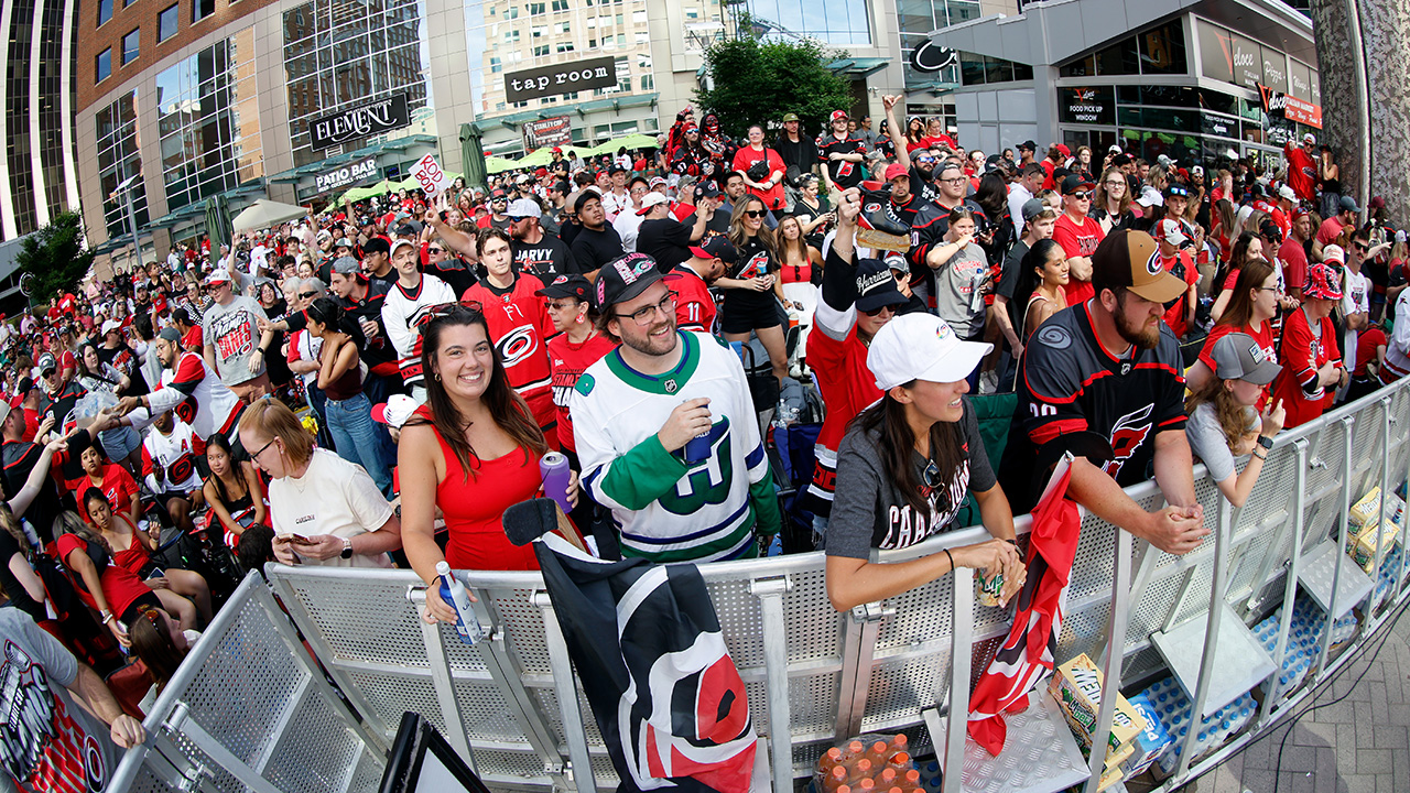 Carolina Hurricanes fans line up on Fayetteville Street for the Stanley Cup Championship celebration on Saturday in Raleigh