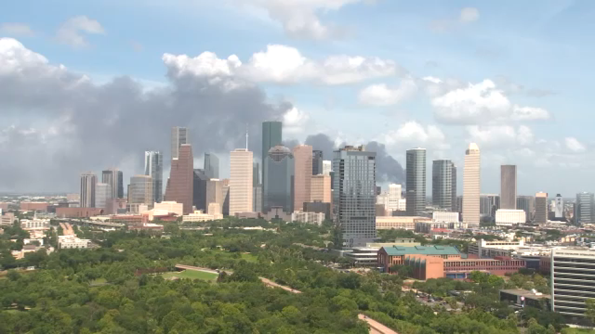 The thick plume of smoke can be seen from our Memorial tower cameras behind the Downtown Houston skyline.