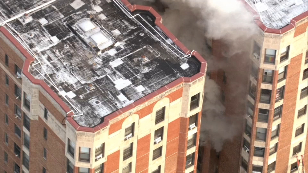 Crews battling high-rise fire on North Side