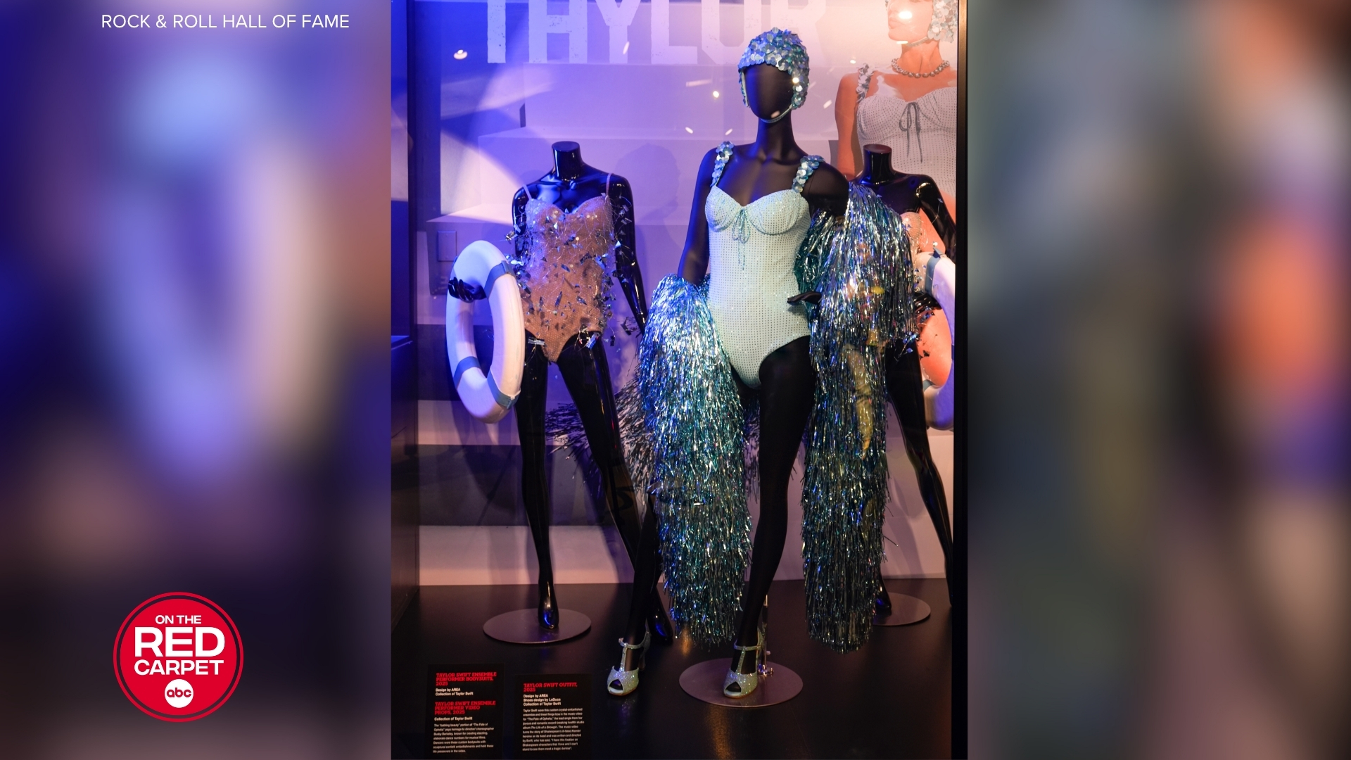 Taylor Swift's blue ensemble from "The Fate of Ophelia" music video on display at the Rock & Roll Hall of Fame.