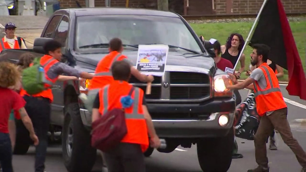Truck drives through protests in Durham