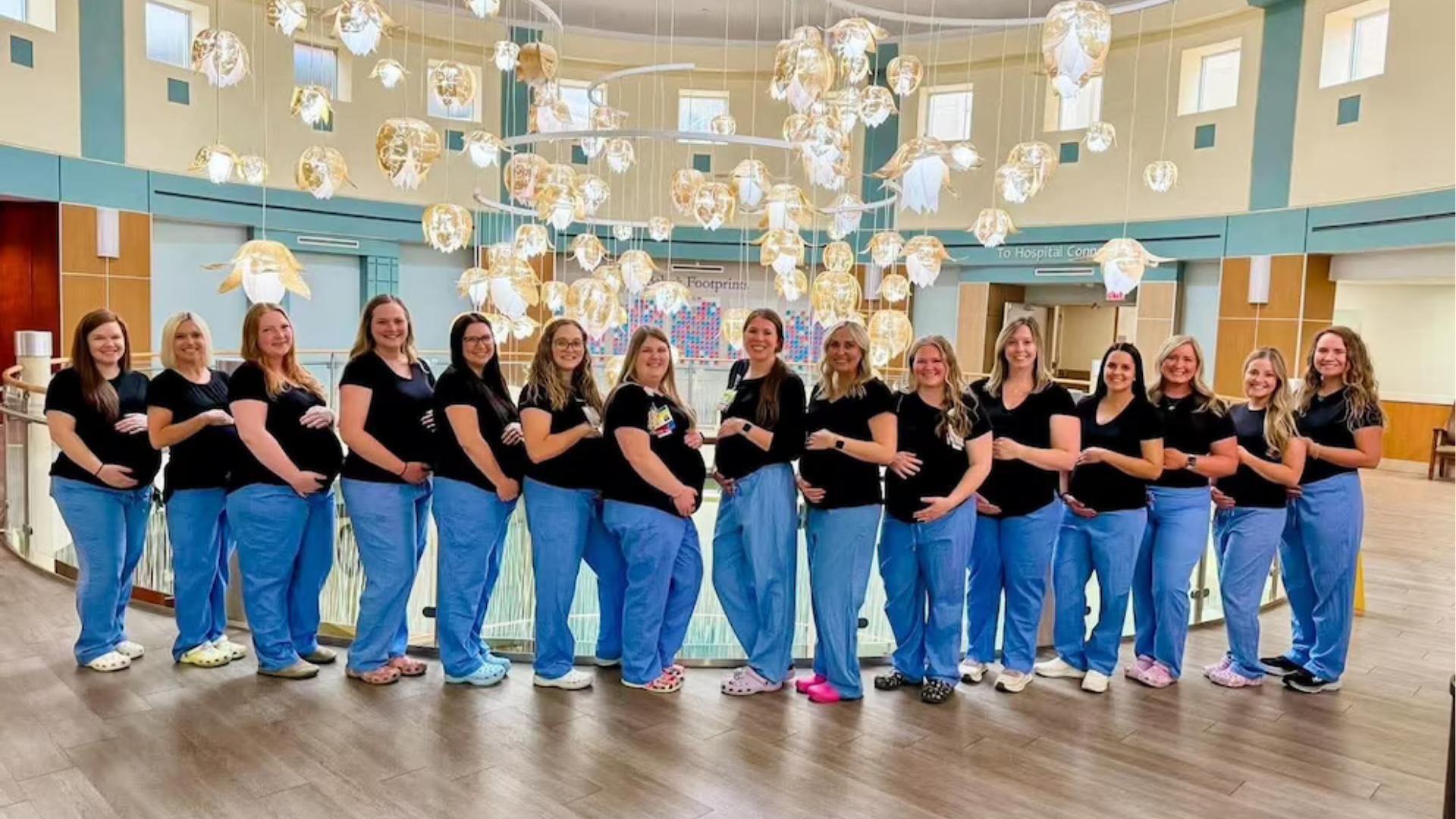 Seventeen nurses in the labor and delivery unit at Miami Valley Hospital in Dayton, Ohio, are all expecting babies at the same time. Pictured are 15 of the 17 expecting nurses.