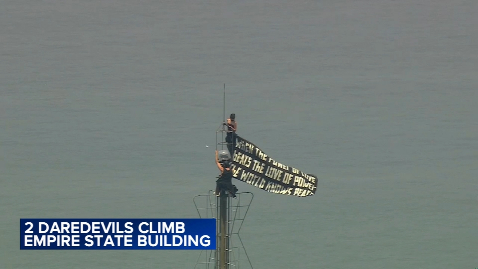 Couple who scaled Empire State Building with banner now face 8 charges