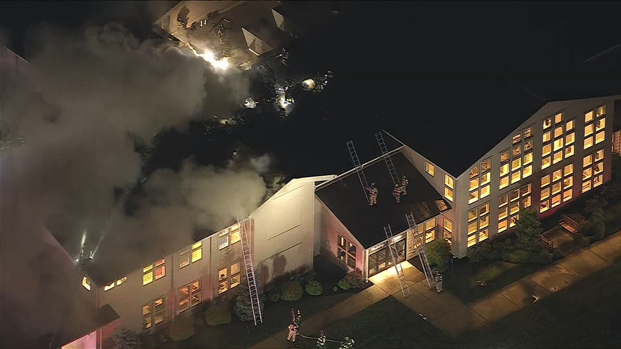 Firefighters battle 4-alarm blaze at church in Medford