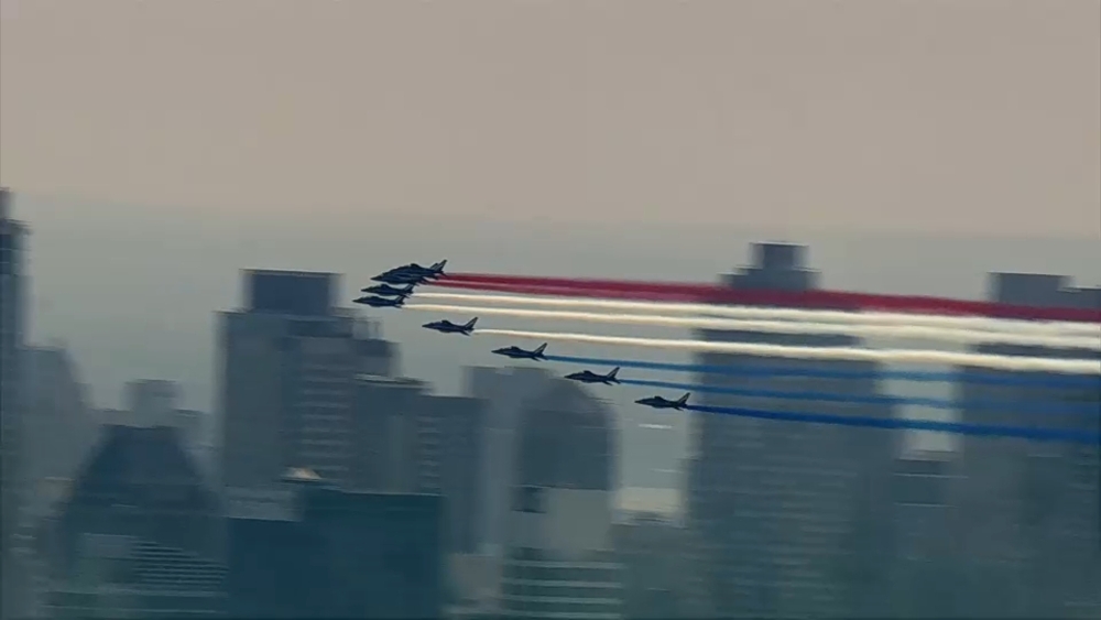 Military flyover ahead of the Sail4th 250 parade