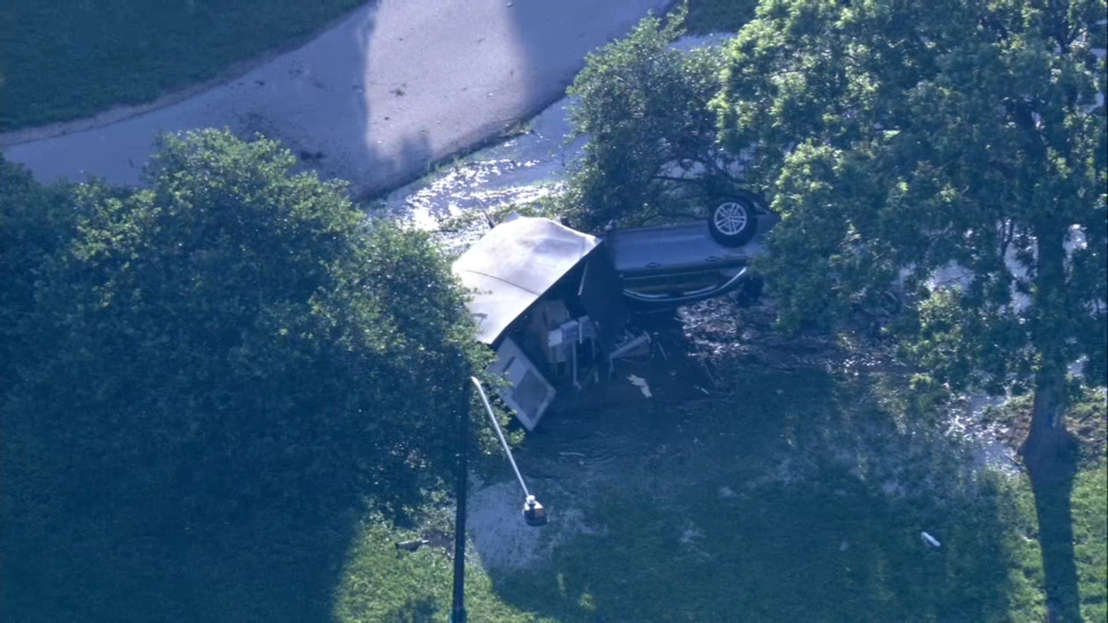 Car rolls over, crashes into shed off of DuSable Lake Shore Drive ...