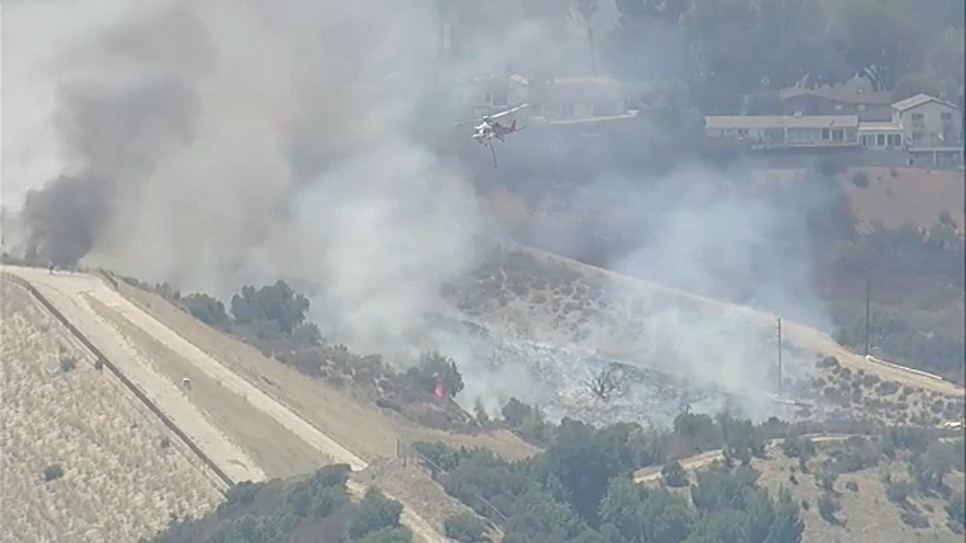 LAPD helicopter makes emergency landing after being hit by drone at Encino brush fire