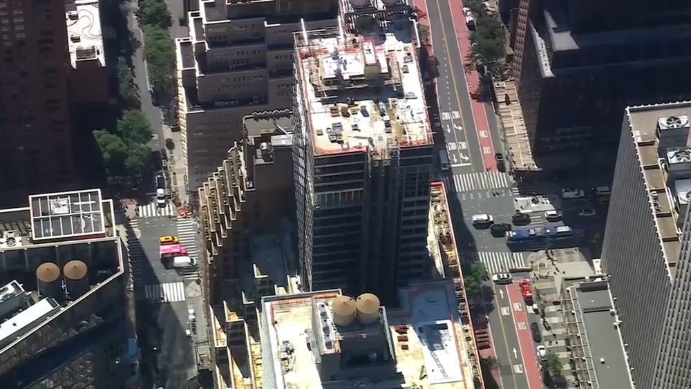 Crews continue to install temporary supports in East Side high-rise after collapse scare