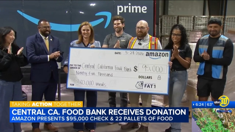Amazon presented the Food Bank with a donation and 22 pallets of food