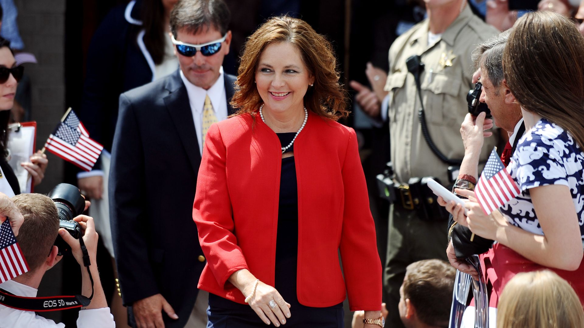 Darline Graham Nordone, sister of Sen. Lindsey Graham, R-S.C., walks to the stage before his announcement for presidency on Monday, June 1, 2015, in Central, S.C.