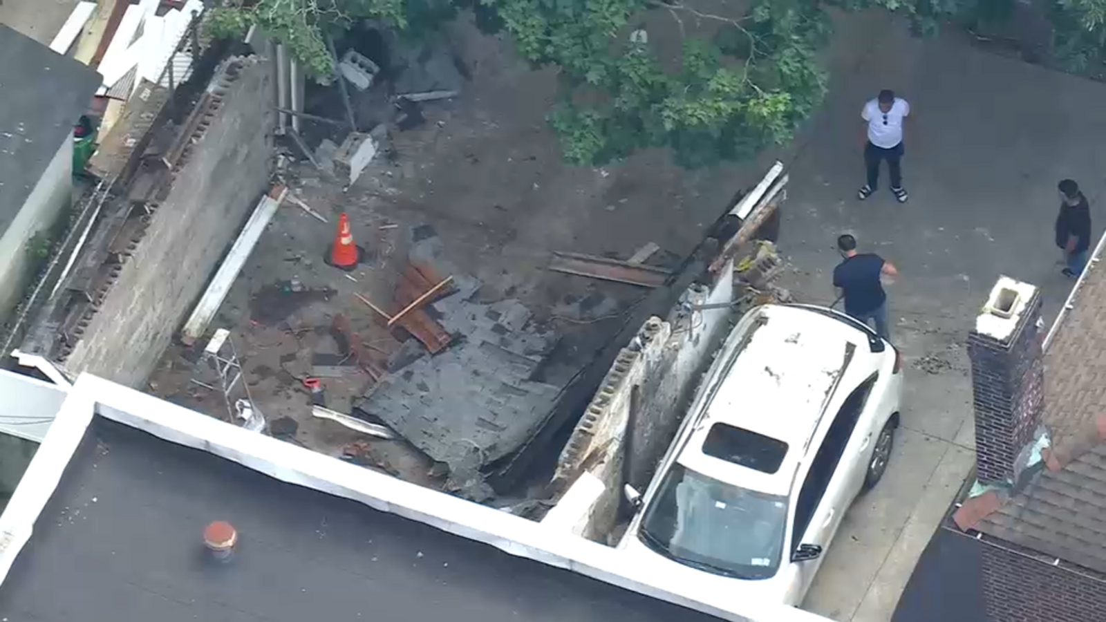1 injured when garage, retaining wall collapse in the Bronx