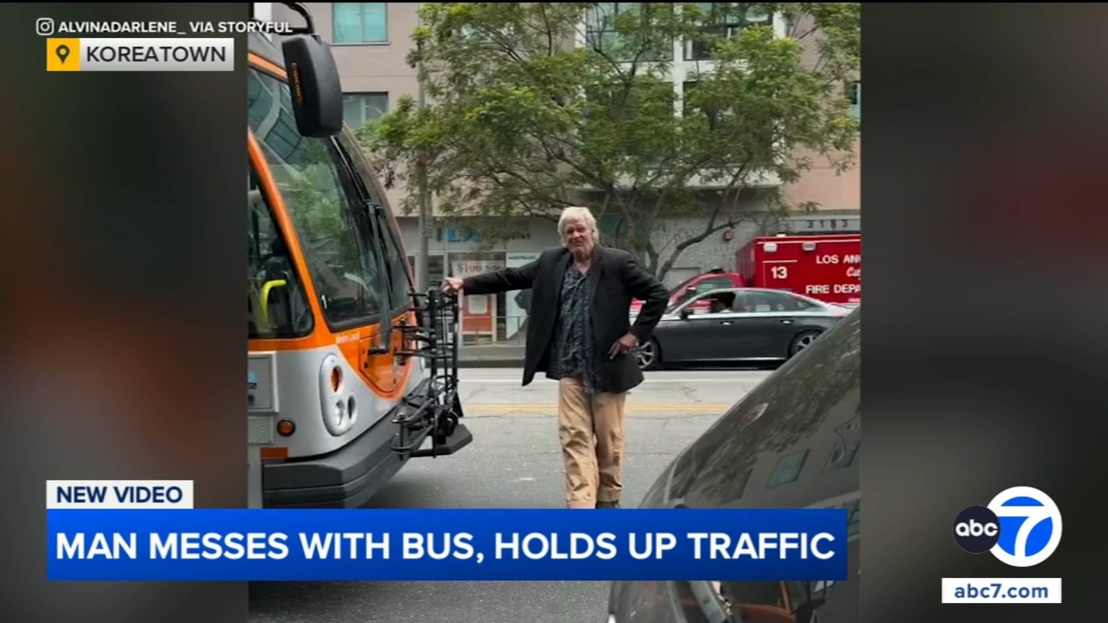 Man stands in front of Metro bus, holds up traffic in Koreatown, video shows Man stands in front of Metro bus, holds up traffic in Koreatown, video shows