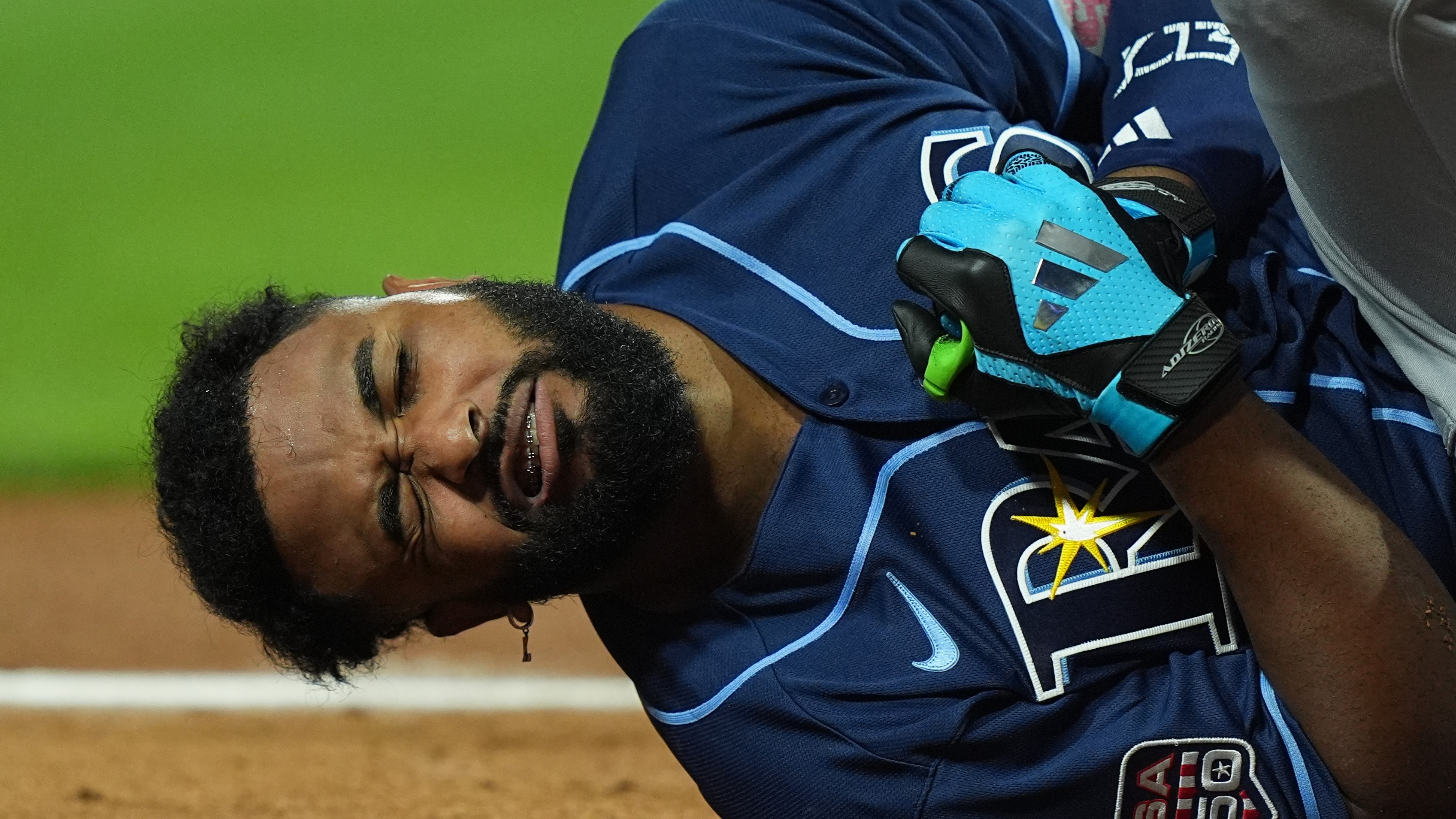 Tampa Bay Rays' Junior Caminero reacts after being hit by a pitch by St. Louis Cardinals' Riley O'Brien in the third inning of the MLB baseball All-Star Game July 14, 2026