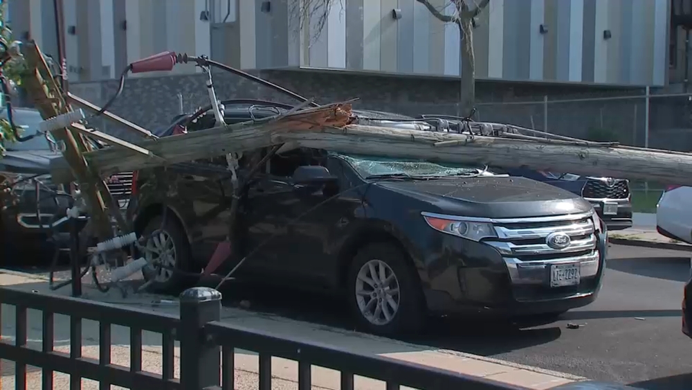 Residents concerned after power poles collapse onto cars, cause outages in Coney Island