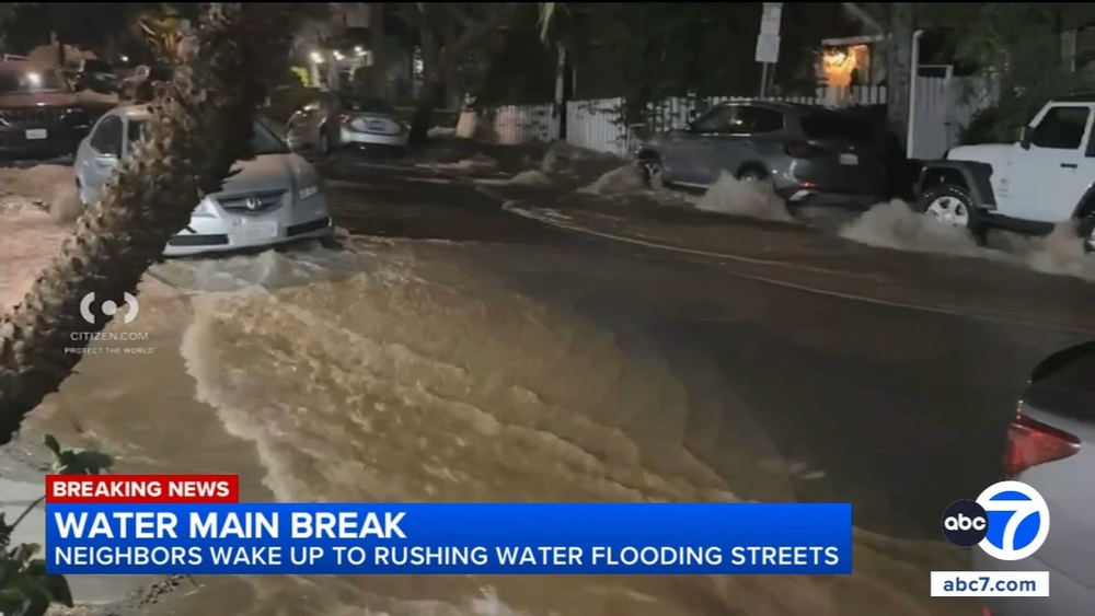 Rushing water floods West Hollywood streets after water main break