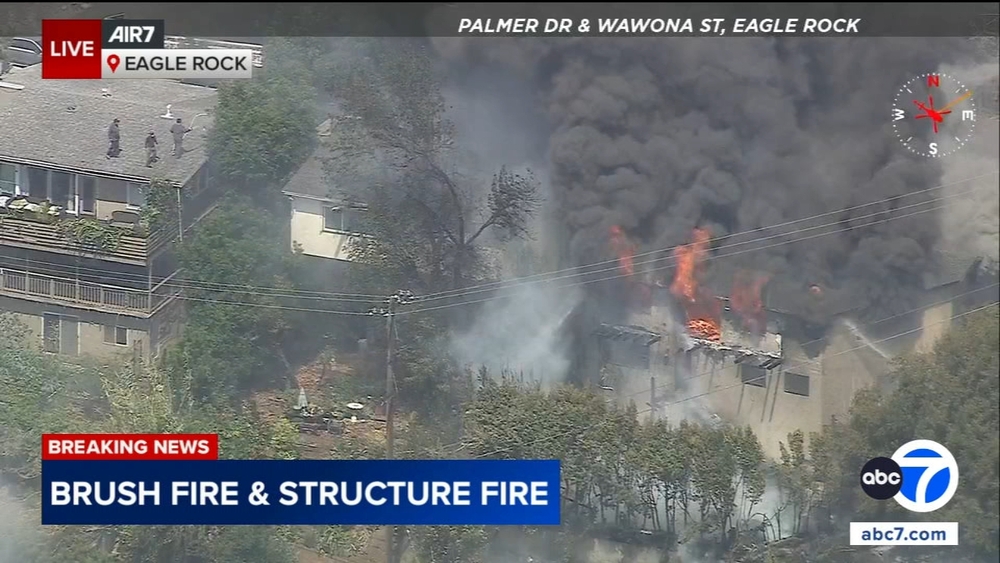 Brush fire in Eagle Rock area engulfs at least 1 home