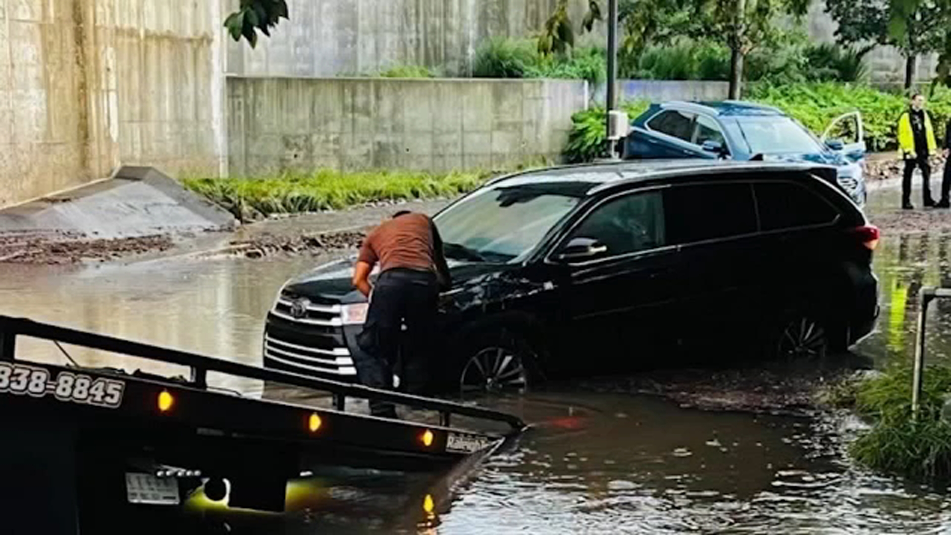 A car is stranded in Raleigh after the storms moved through.