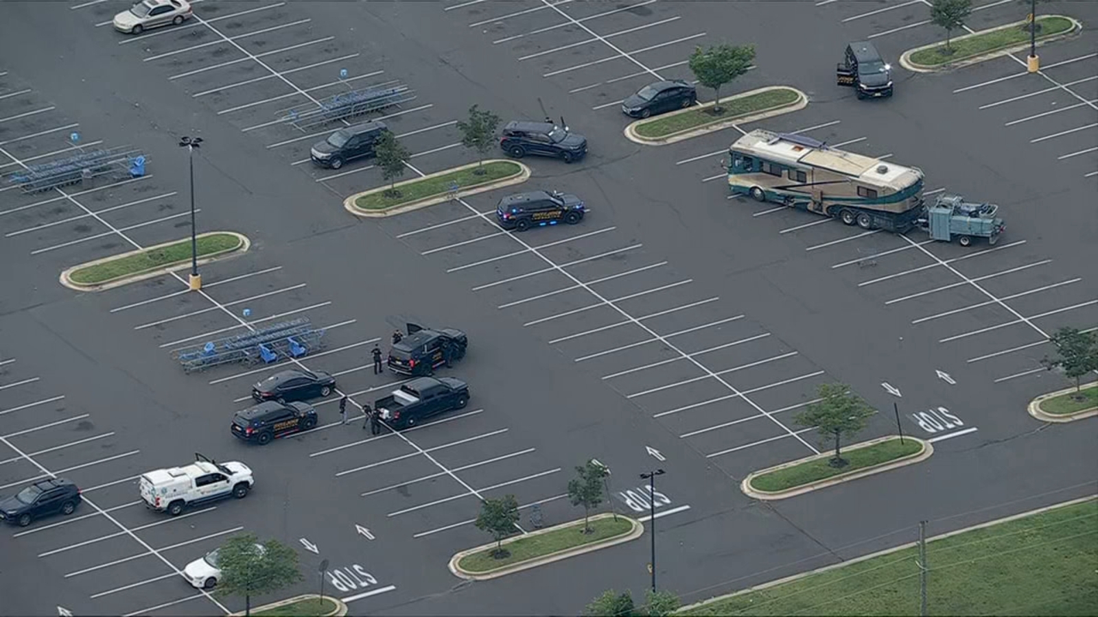 Police surround RV due to barricade situation at Walmart parking lot on Rt. 38 i...