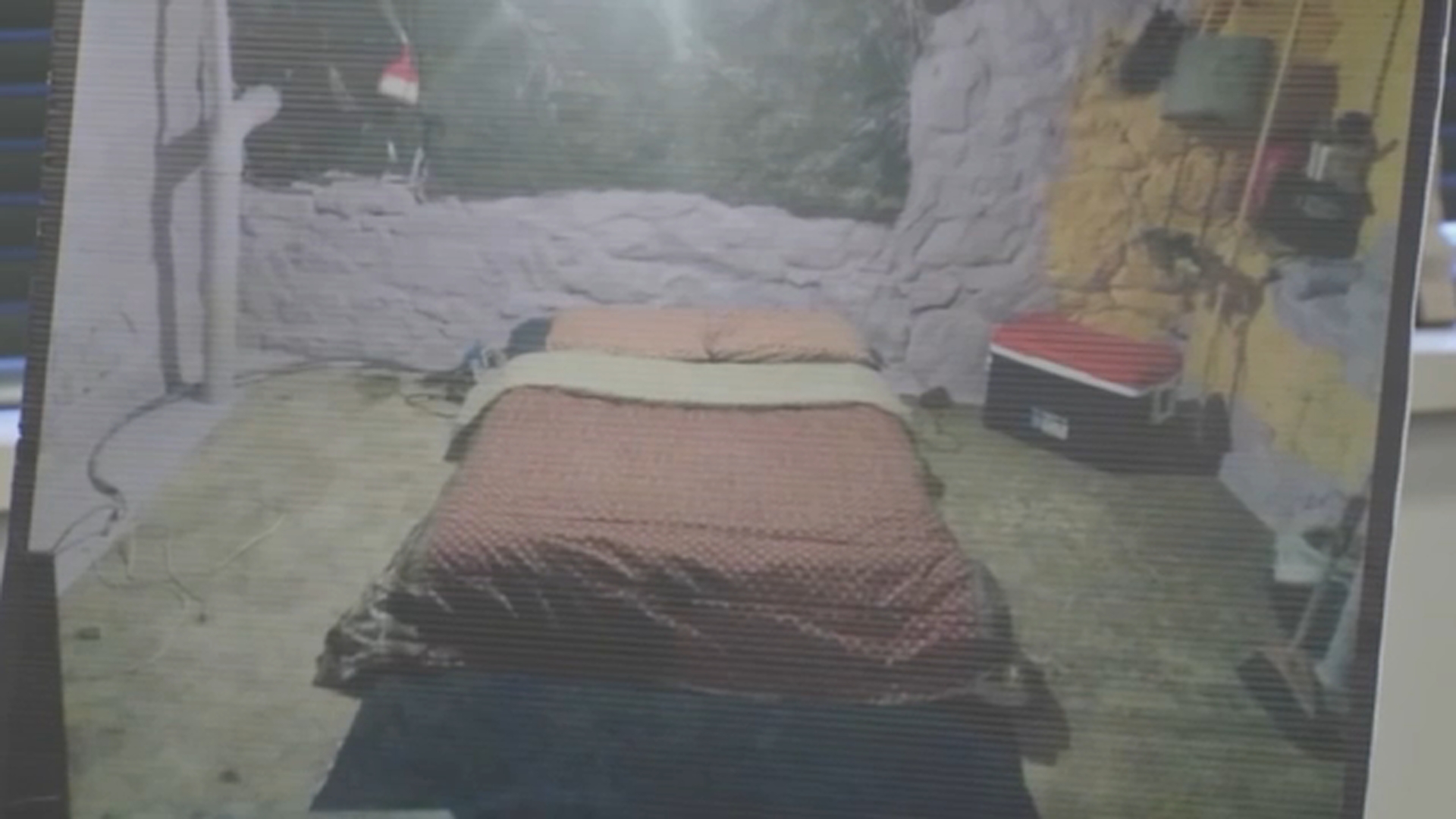 Investigators are attempting to identify the location of a room depicted in one of the images recovered during the investigation.