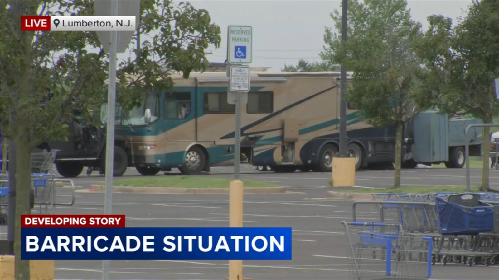 Man in custody after hourslong RV standoff outside Walmart in Lumberton
