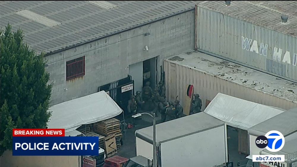 SWAT officers swarm South LA warehouse