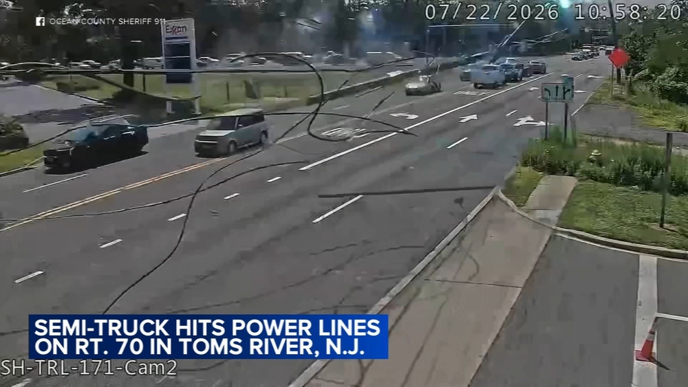 Video captures semi-truck bringing down power lines in NJ