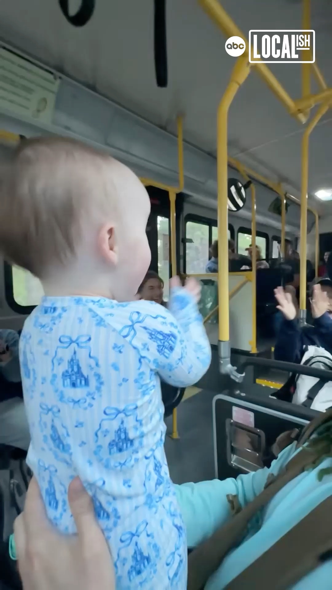 This baby was delighted to lead this bus in a round of applause!