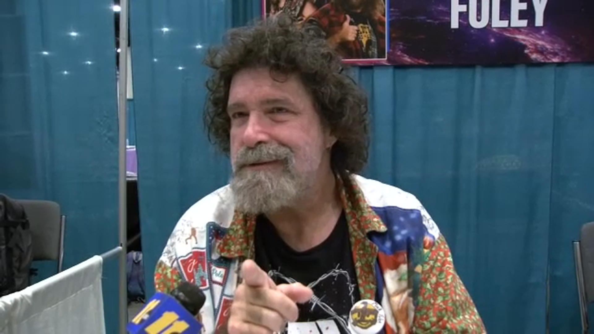 Mick Foley was part of a group of well-known wrestlers, including Jake "The Snake" Roberts, that had booths set up in front of the Exhibit Hall.