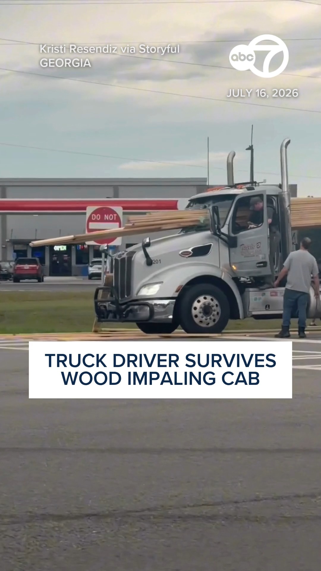 Truck driver survives wood impaling cab