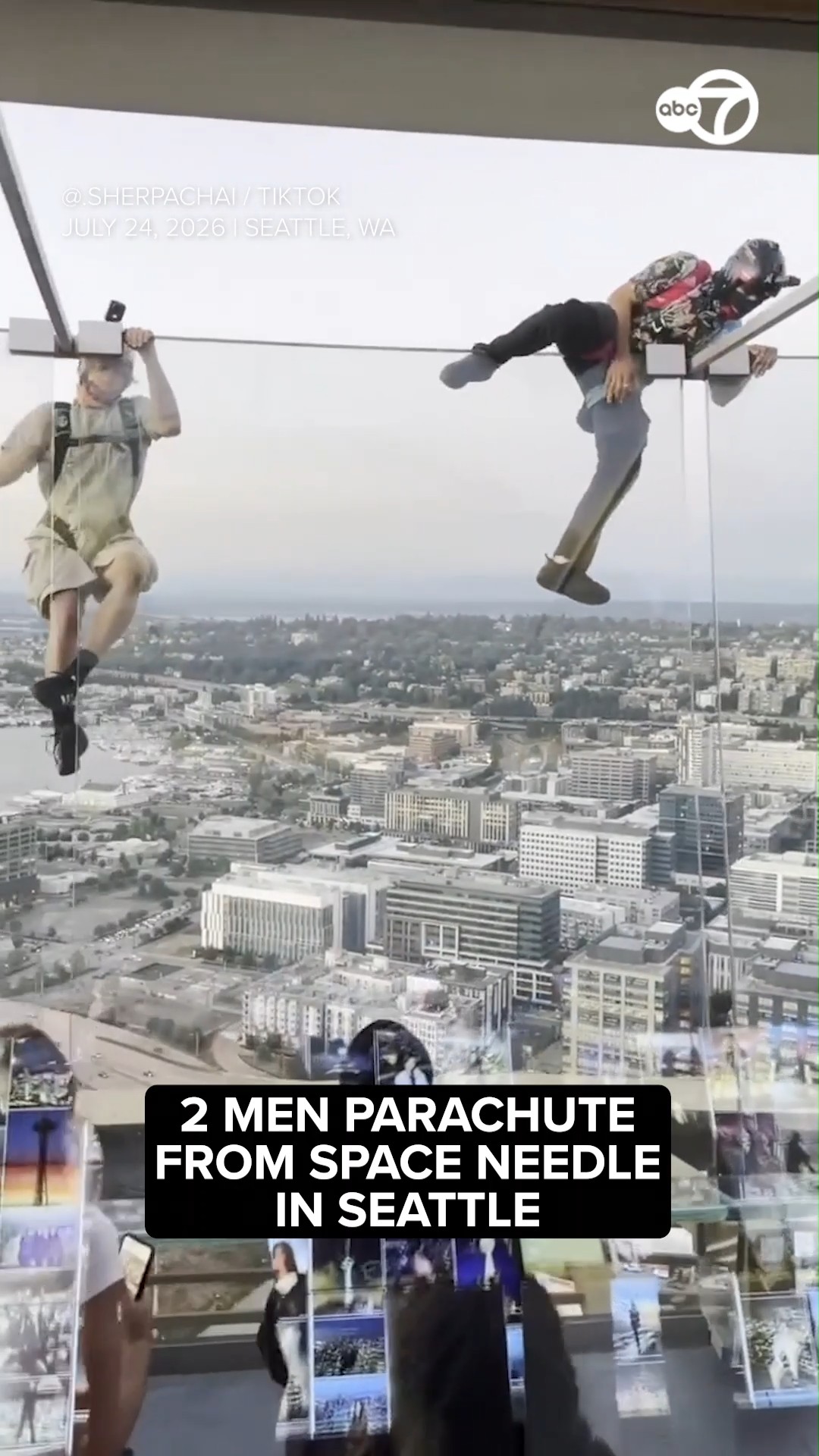 2 men parachute from Space Needle in Seattle