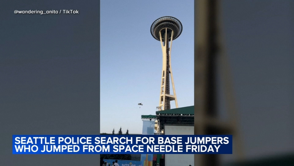 Seattle police searching for 2 men who parachuted from the Space Needle
