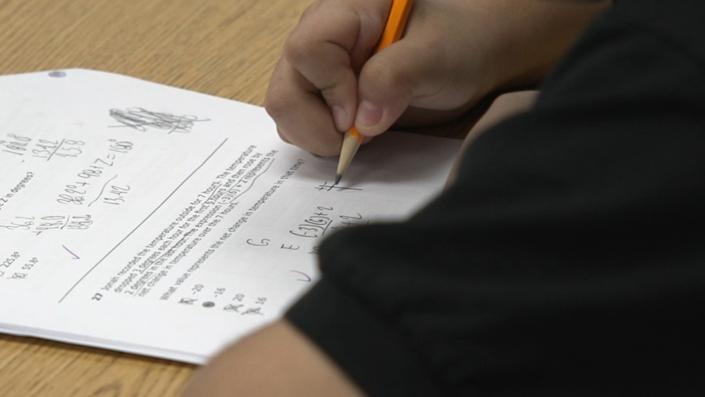 YES Prep math teacher helps students calculate their potential