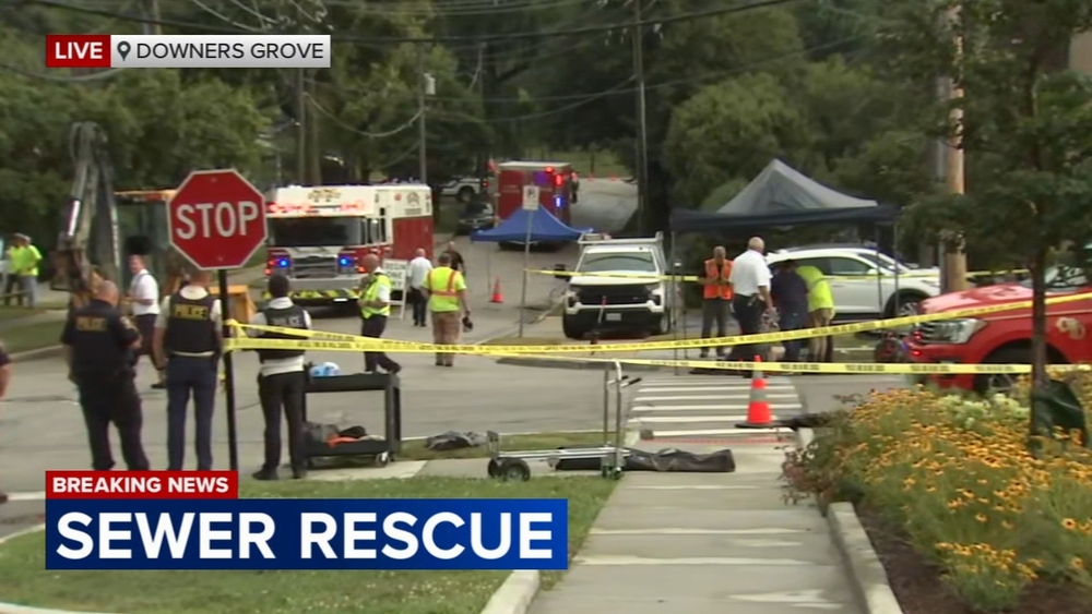 Contractors stuck in west suburban sewer