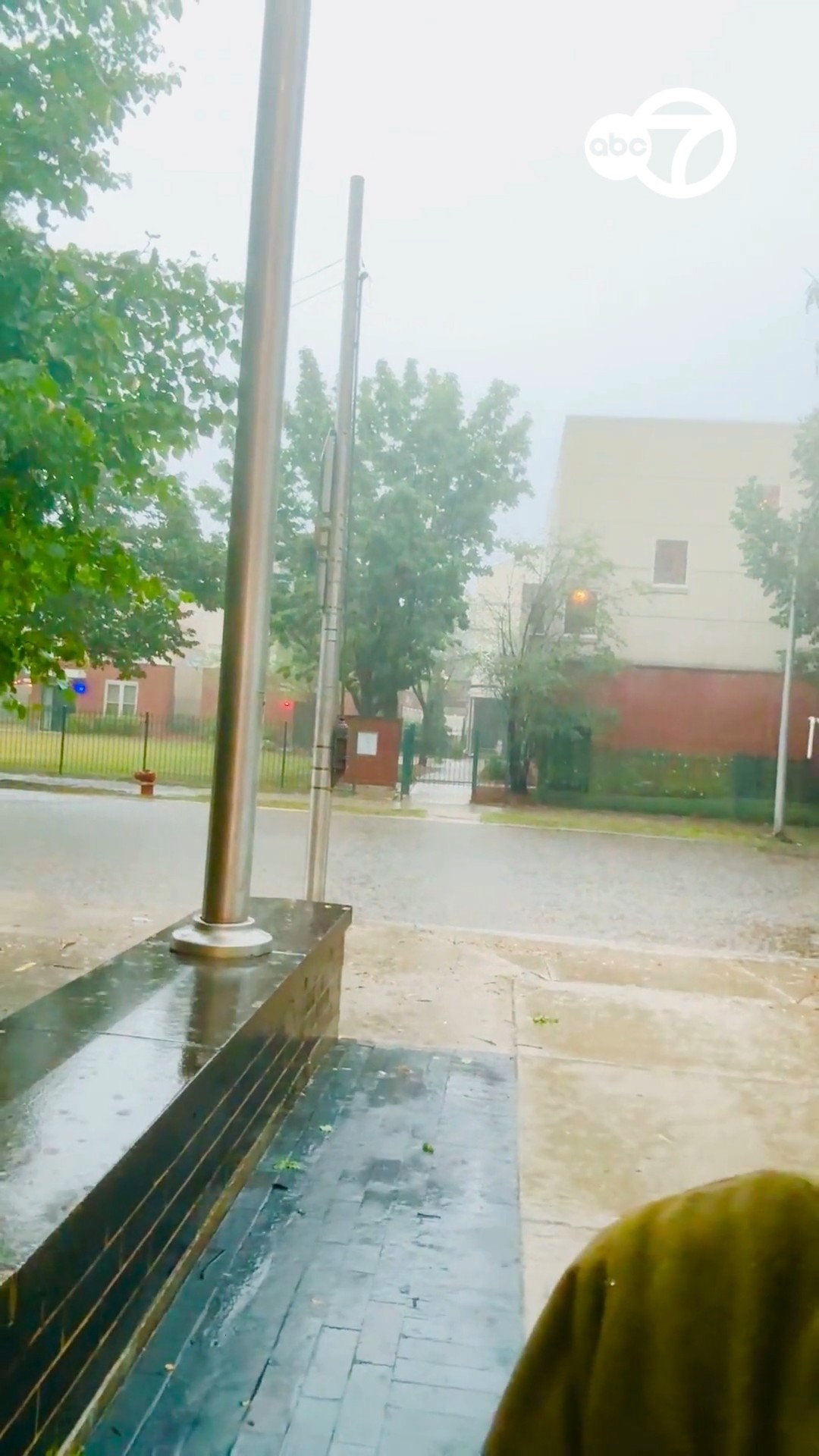 Cars stuck after driving through flooded streets in Little Village