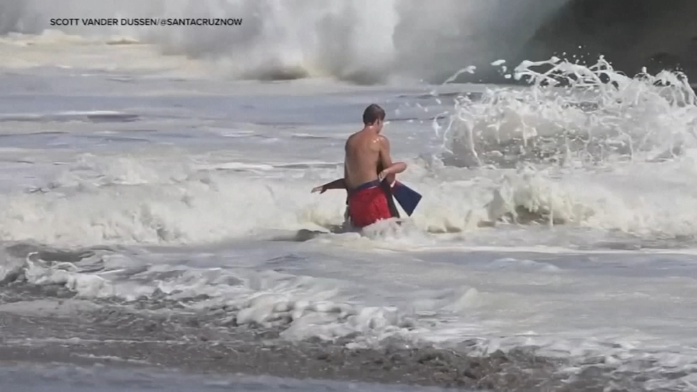 Heart-pounding video shows intense waves as lifeguards rescue boy at California beach