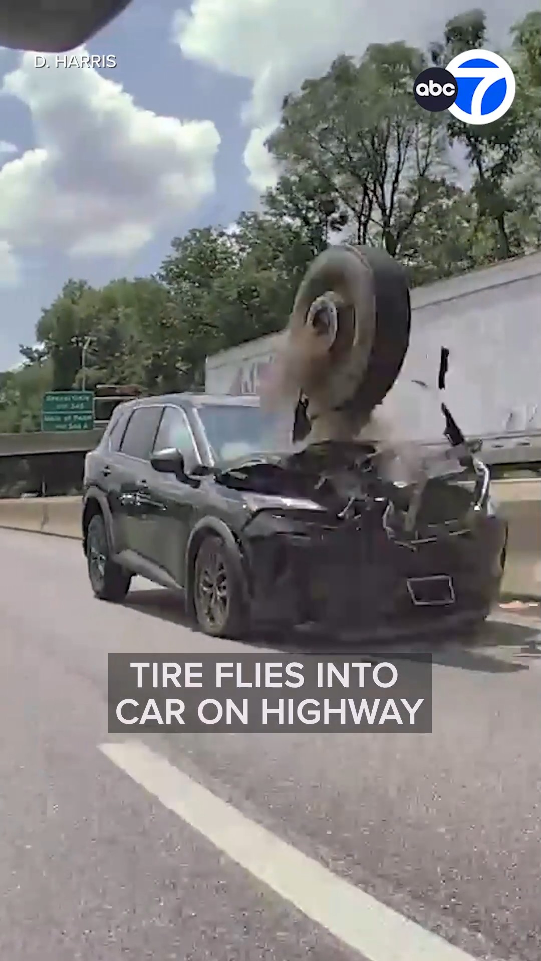 Tire flies into car on highway
