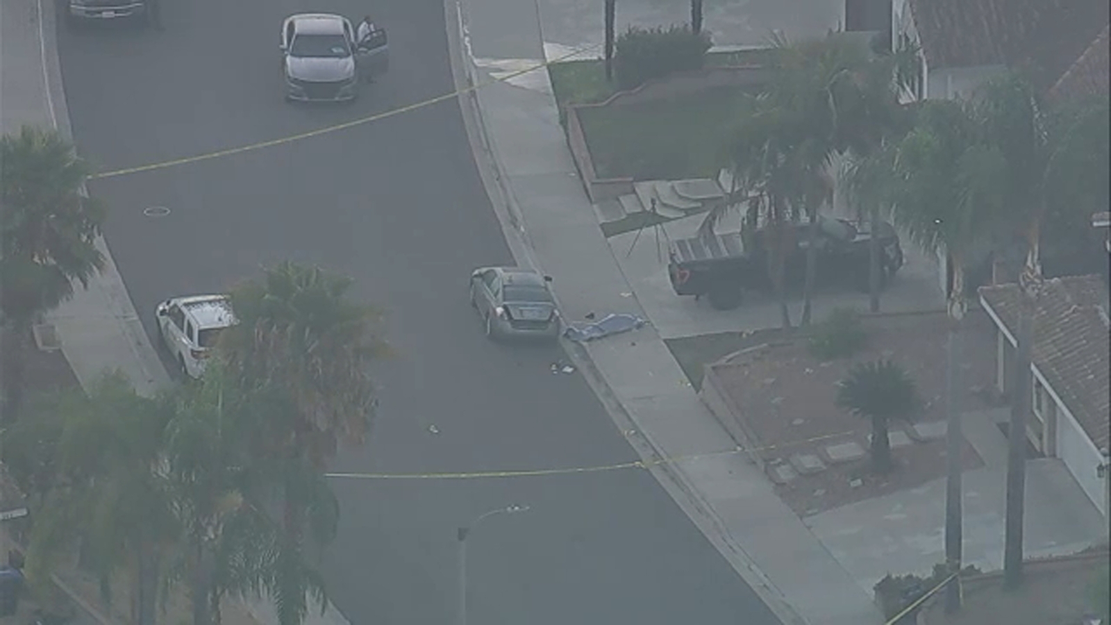 Man shot by sheriff's deputies after body found in car trunk in Chino Hills
