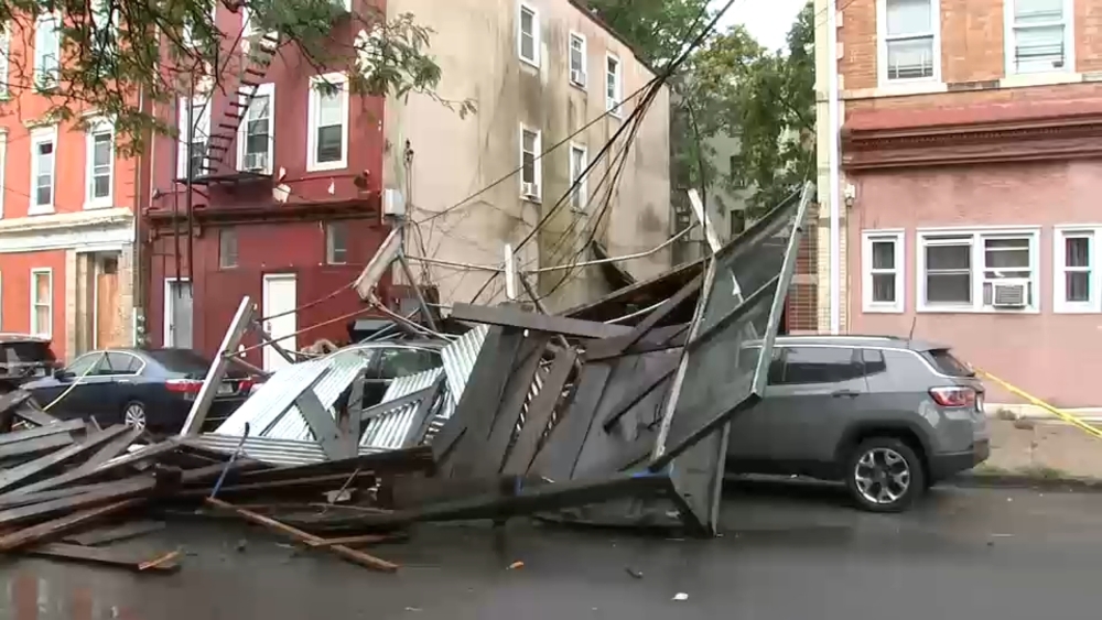 Building under construction collapses and crushes parked cars in Mount Vernon