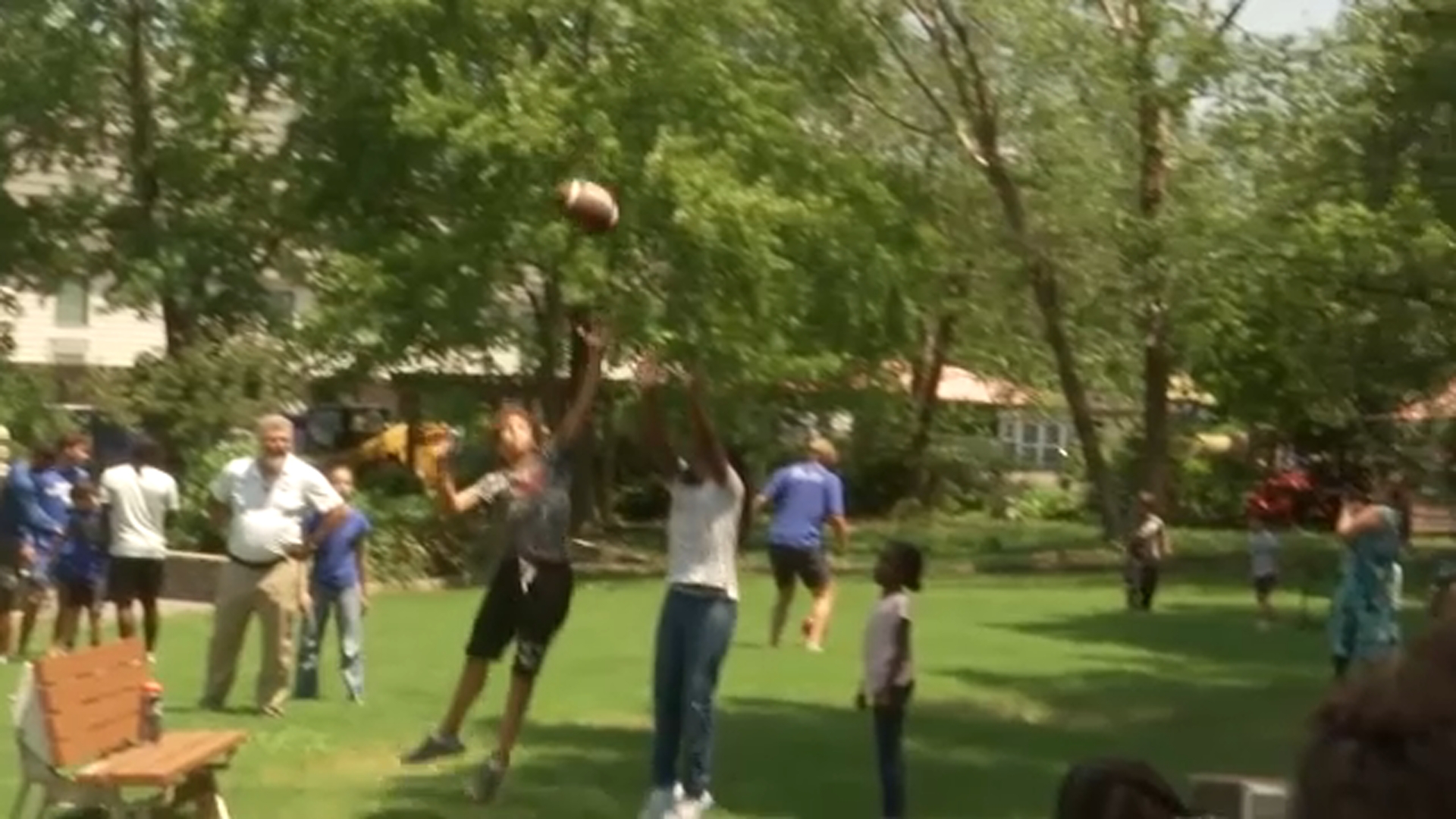 Children got to learn plays, try out pads, and toss the ball with Duke players on Thursday.
