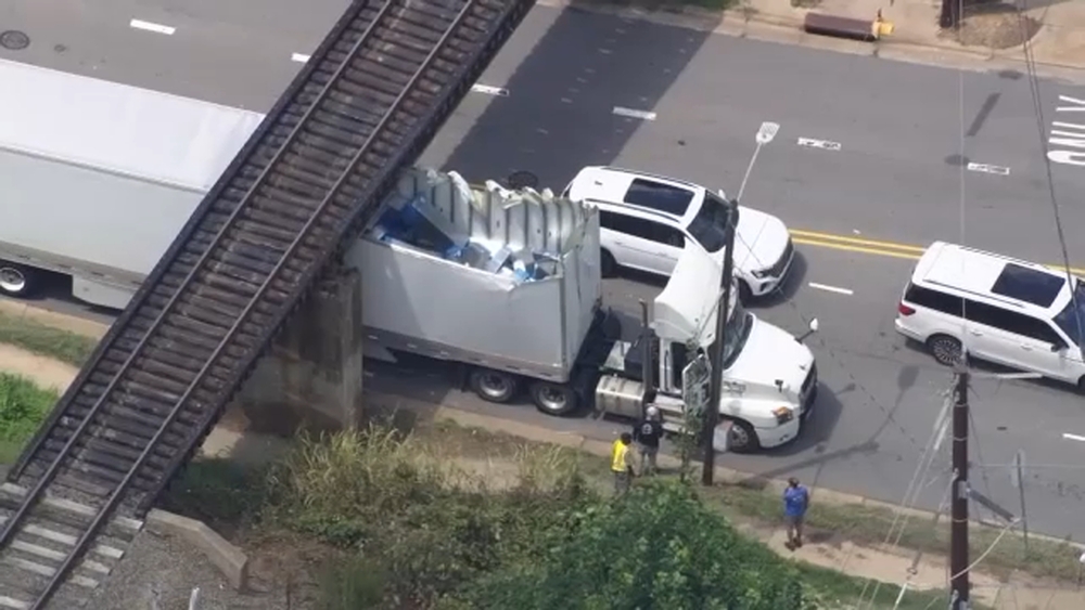 Two trucks strike Raleigh's notorious Peace Street Bridge