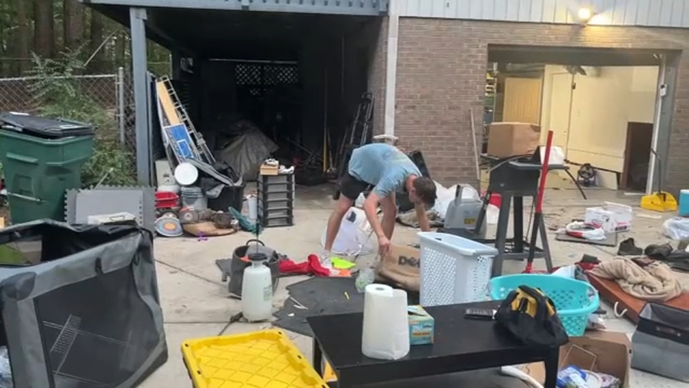 Durham family cleans up mess after third flood in four years