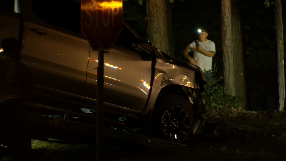 Truck crashes into North Raleigh apartment building