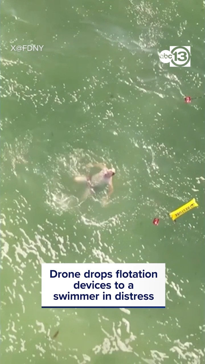 Drone drops flotation devices to a swimmer in distress