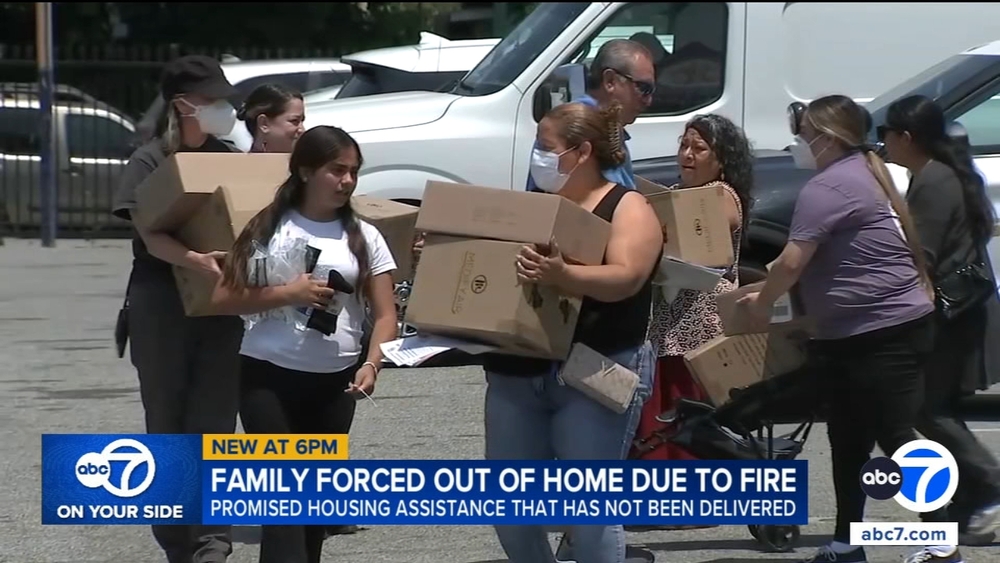 Family camps near beach to escape stench from Lineage warehouse