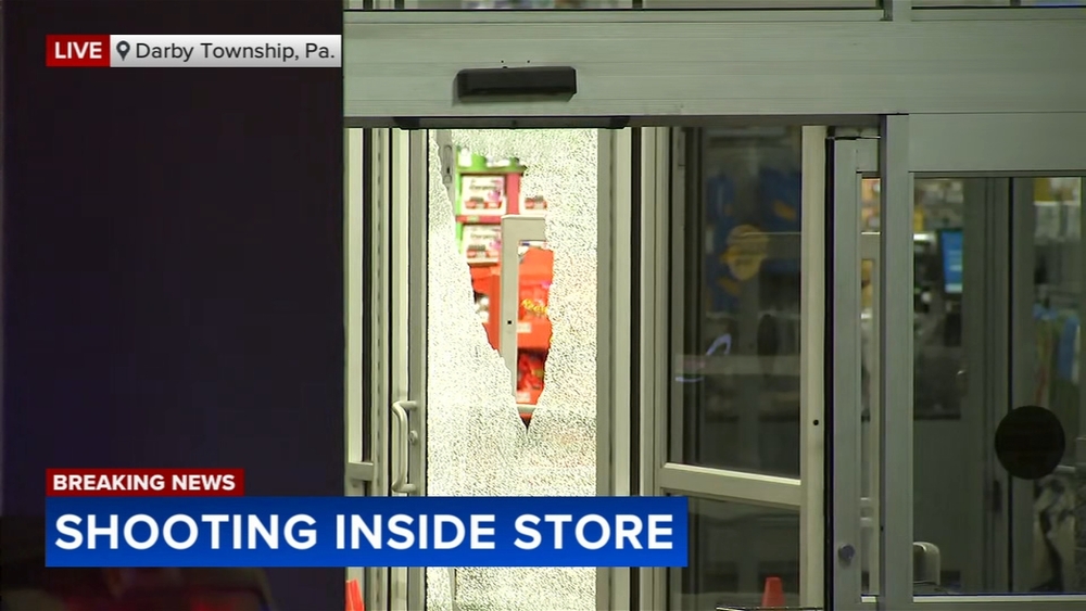 Walmart employee shot during argument between 2 men; suspect wanted