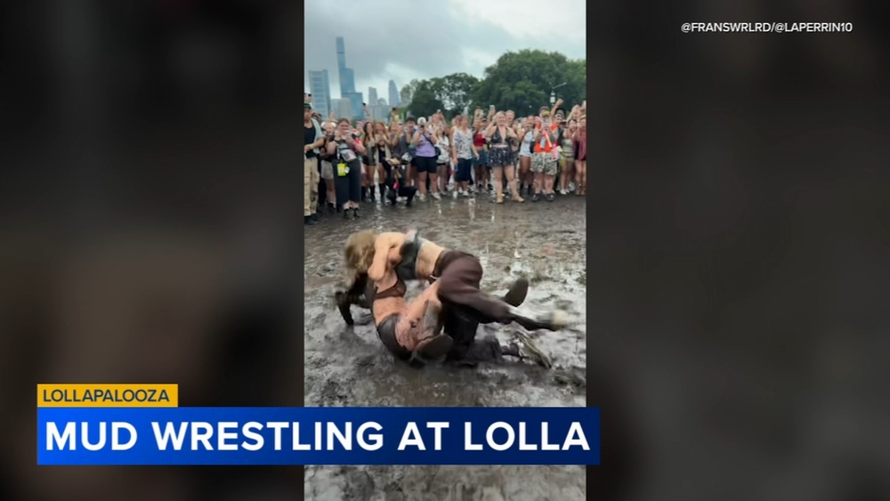 Fans embrace rain and mud wrestle at Lollapalooza Chicago